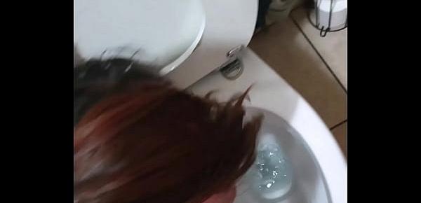  Pigtailed teen sucks dick after being pissed on and licking the toilet clean | face spitting and slapping